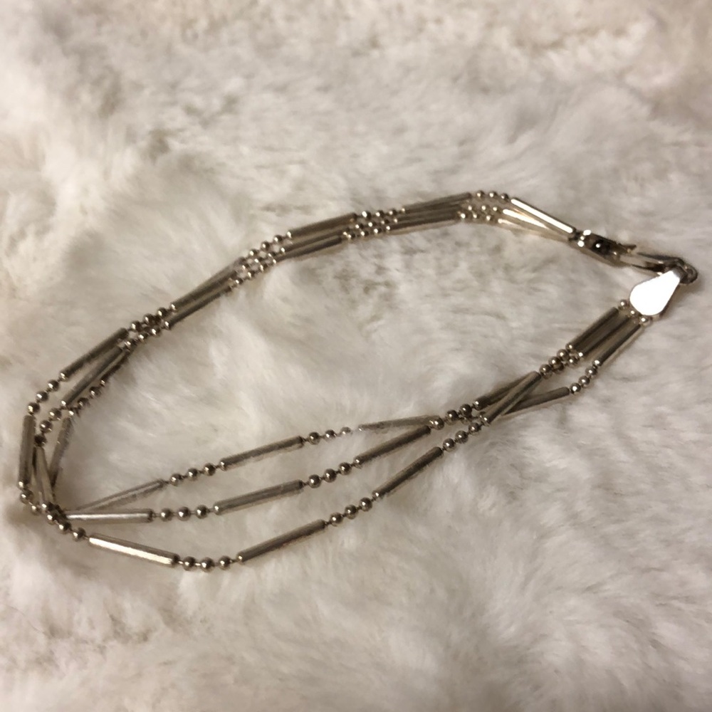 Modern sterling silver bracelet triple strand